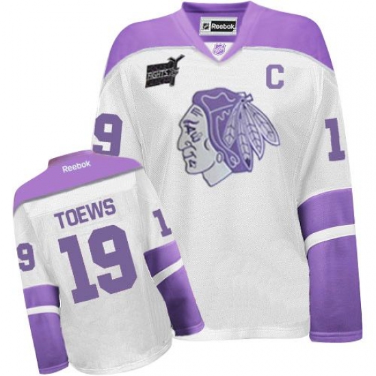 Women's Reebok Chicago Blackhawks 19 Jonathan Toews Authentic White/Purple Thanksgiving Edition NHL Jersey